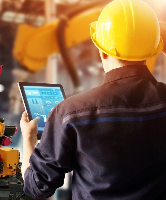 engineer-check-control-welding-robotics-automatic-arms-machine